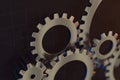 Meshing mechanical gears, metallic parts, 3d rendering