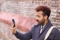 Mesmerised man looking at his phone Royalty Free Stock Photo