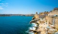 Mesmerising shot of the beautiful town of Valletta with ancient buildings and crystal clean water