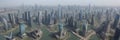 A mesmerising view of the skyscrapers of Shanghai, China, from the Wangpu River. High-rise buildings and bridges are reflected in Royalty Free Stock Photo