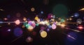 Dynamic Abstract Animation Featuring Multicolored Bokeh Circles and Sparkling Starbursts Against a Dark Background with Streaking Royalty Free Stock Photo