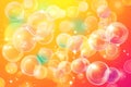 A mesmerizing array of multicolored bubbles overlapping on a vivid orange and yellow gradient Ai ganerated