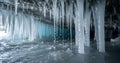 Mesmerizing Blue Ice Cave with Dripping Icicles Royalty Free Stock Photo