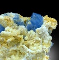 Mesmerizing Deep blue celestine celestite with calcite matrix specimen from afghanistan Royalty Free Stock Photo
