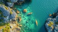 Drone view on rocks and canoes floating on turquoise water .