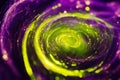 A mesmerizing fractal pattern resembling endless spirals, glowing in neon green and purple, creating