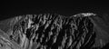 Mesmerizing grayscale of rocky mountains - great for wallpaper