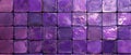 A mesmerizing grid of intricate, shimmering amethyst-colored glass tiles, creating a captivating, otherworldly visual