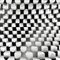 A mesmerizing grid of undulating, monochromatic geometric forms creates an optical illusion of depth and movement. Royalty Free Stock Photo