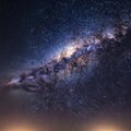 Of stars forms a luminous band across the center set against a dark Royalty Free Stock Photo