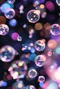 A mesmerizing image of translucent bubbles floating against a dark backdrop