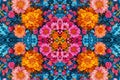 A mesmerizing kaleidoscope background featuring symmetrical patterns in bright colors.