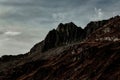 Mesmerizing landscape of the rocky mountains on a dark cloudy day