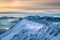 Mesmerizing landscape of the snowy Blencathra ridgeline at soft sunset - great for a background