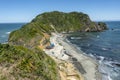 Mesmerizing landscape of a tropical beach among green cliffs