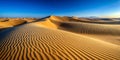 Mesmerizing Pattern of Wind Swept Sand Dunes Under Clear Blue Sky AI-Generated Content Royalty Free Stock Photo