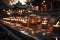 A mesmerizing photo of a Buddhist temple illuminated by soft candlelight or lanterns, creating a serene and peaceful ambiance.