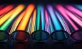 A mesmerizing row of illuminated translucent tubes creates a vibrant spectrum of colors. Royalty Free Stock Photo