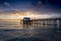 Mesmerizing scene of the pier at Newport Beach under sunset dramatic sky, California Royalty Free Stock Photo