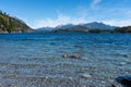 Mesmerizing shot of beaches with rocks and hidden mountainous landscapes in southern Argentina