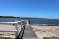 Mesmerizing shot of  Culburra Beach, South Coast, Australia with a bridge under the clear sky Royalty Free Stock Photo