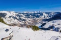 Mesmerizing shot of the snow-covered mountains of Saalbach-Hinterglemm and the ski areas