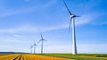 A mesmerizing sight of wind turbines standing tall in a vast field