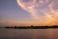 Mesmerizing soft sunset over the calm coastline of Danga bay