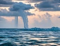 The mesmerizing spiral pattern of a waterspout forming over a body of water Royalty Free Stock Photo