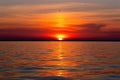 Mesmerizing sunset over the sea in bright fiery colors