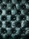 Mesmerizing tufted leather in a rich, emerald green hue forms a visually captivating diamond pattern, creating a tactile Royalty Free Stock Photo