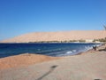 The mesmerizing view of the deep blue waters of Haql beach in Saudi Arabia. Royalty Free Stock Photo