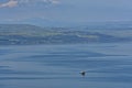 Mesmerizing view of the Galilee sea with the coastal land in the background in Israel