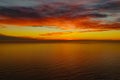 Mesmerizing view of the golden sunset over a tranquil sea - perfect for wallpaper Royalty Free Stock Photo