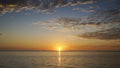 Mesmerizing view of a golden sunset over the tranquil sea - perfect for wallpaper Royalty Free Stock Photo
