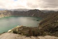 Mesmerizing view of Laguna Quilotoa in Quinta, Ecuador with a cloudy sky background