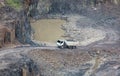 Mesmerizing view of open cast mining quarry with machinery at work in Brazil