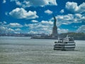 Mesmerizing view of a white cruise ship with the Statue of Liberty in the USA