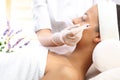 Mesotherapy microneedle, the woman at the beautician