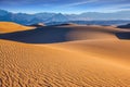 Small sandy ripples on orange barkhans