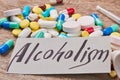 Message alcoholism, medical pills close up.