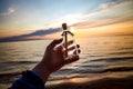 Message in the bottle against the Sun setting down Royalty Free Stock Photo