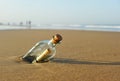 Message in a bottle on the beach