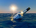 Message in the bottle, bottle floating in the ocean at sunset Royalty Free Stock Photo