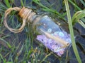 Message in Bottle in the water Royalty Free Stock Photo