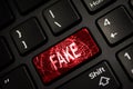Message on broken red enter key of keyboard. Computer fake news attack warning. Copy space Royalty Free Stock Photo