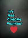 Message corona update written with a red heart on Blackboard in an abstractly grey blurred photo, Covid-19 message, Royalty Free Stock Photo