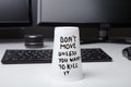 Message On Disposable Glass Over Desk Royalty Free Stock Photo