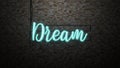 The message dream eon light on Brick wall bcakground Royalty Free Stock Photo