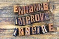 Enhance improve inspire letterpress Royalty Free Stock Photo